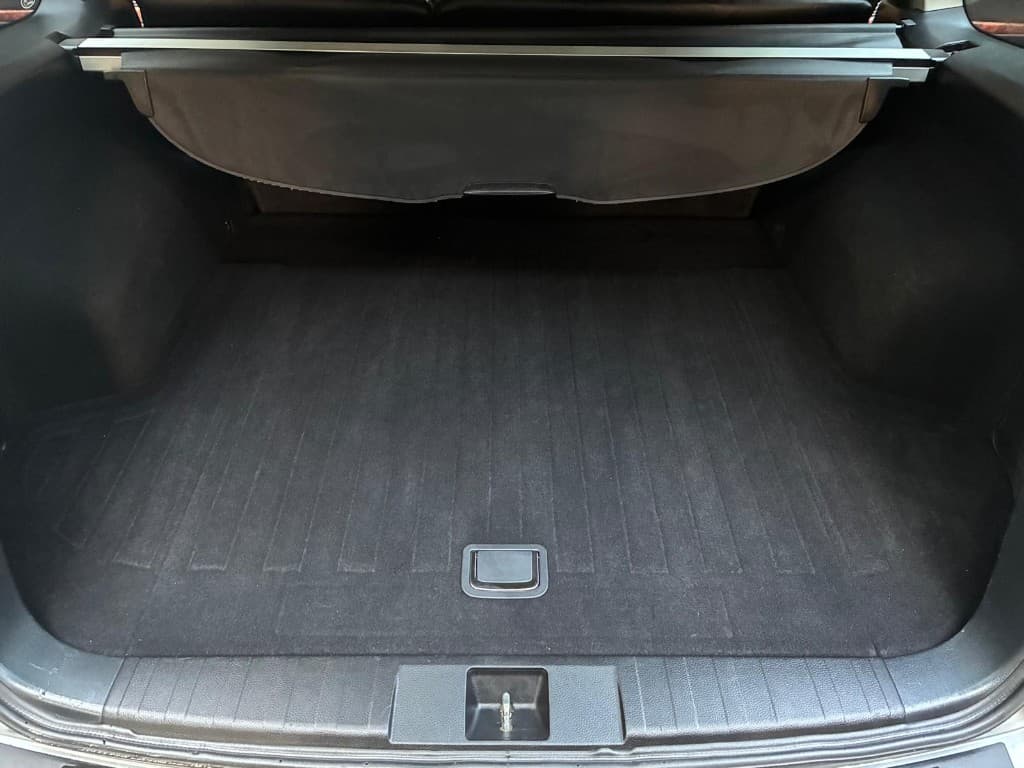 Clean carpeted trunk floor after professional trunk detailing